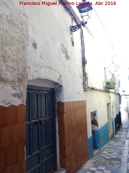 Calle Obispo Arquellada - Calle Obispo Arquellada. Arco rebajado de ladrillo blanqueado