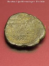 Obulco. Moneda Unidad de Obulco. Reverso arado, yugo y espiga. Museo Arqueol�gico Provincial de Ja�n