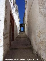 Calle de los Caballeros Santiaguistas. Al fondo el Arco de Cavalcavia