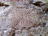 Eremitorio de la Cueva de las Cruces. Grabado cuadrangular rayado