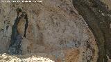 Pinturas rupestres y cazoletas Abrigo Trepada del Clarillo III. Abrigo