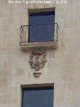 Casa de La Asegurada. Escudo