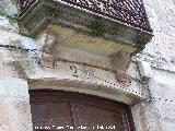 Casa de la Calle Sagunto n 2. Arco rebajado y mnsulas