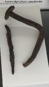 Palacio ibero del Cerro de la Merced. Clavos de cabeza plana. Exposici�n en el Museo Ibero de Ja�n